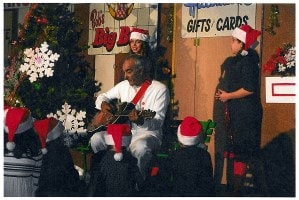 The Spirit of Christmas on Main Street — store scene with cast, 2009